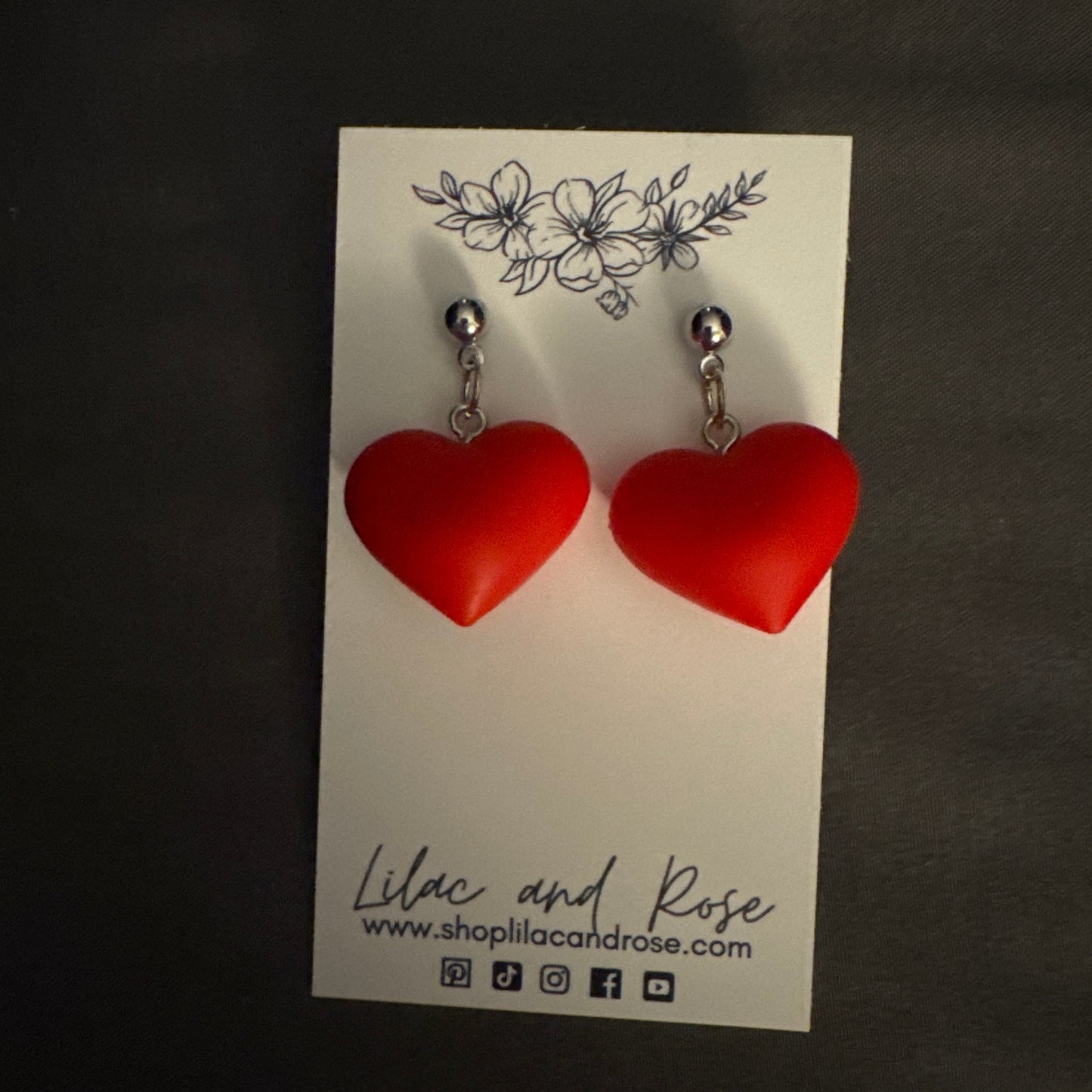 3D heart stud earrings