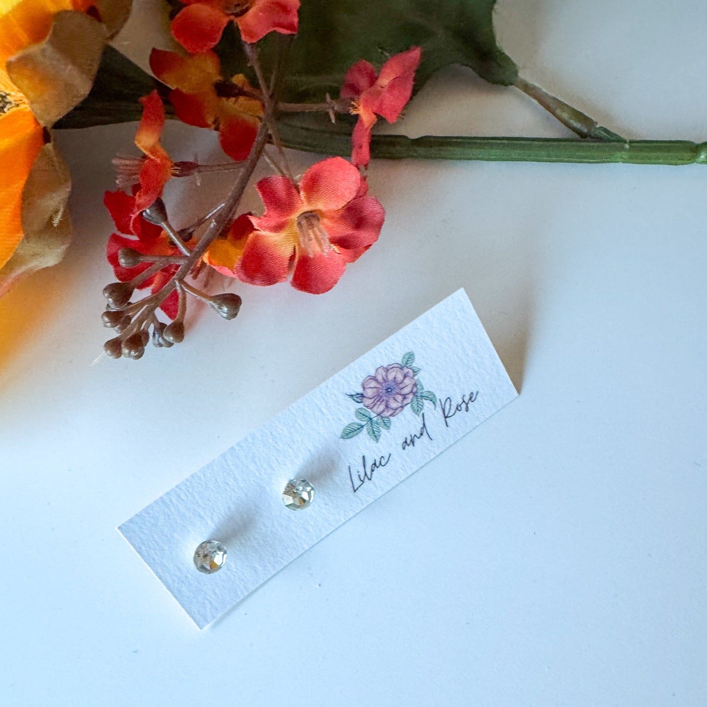 CZ stud earrings round cut sparkle Lilac and Rose