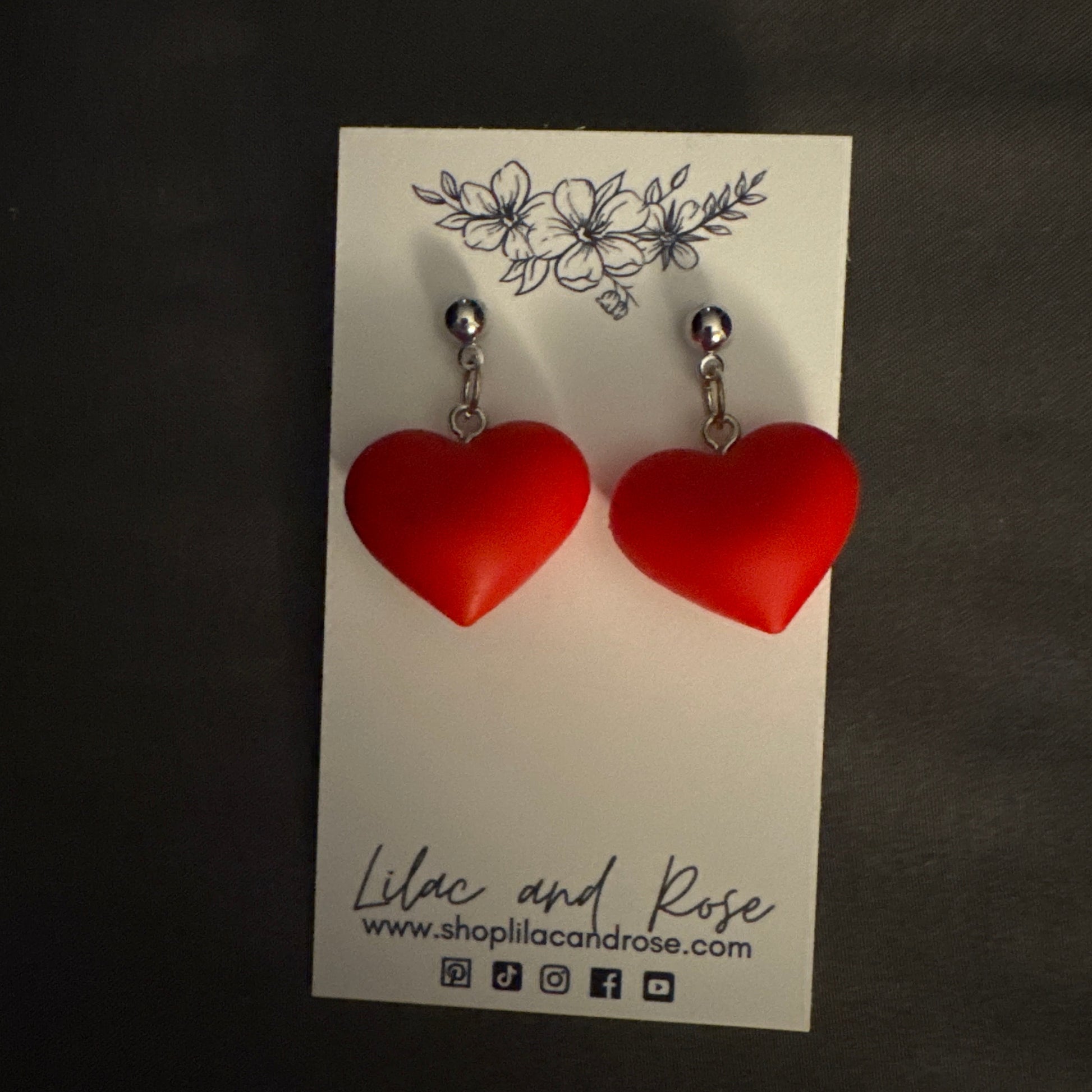 3D heart stud earrings