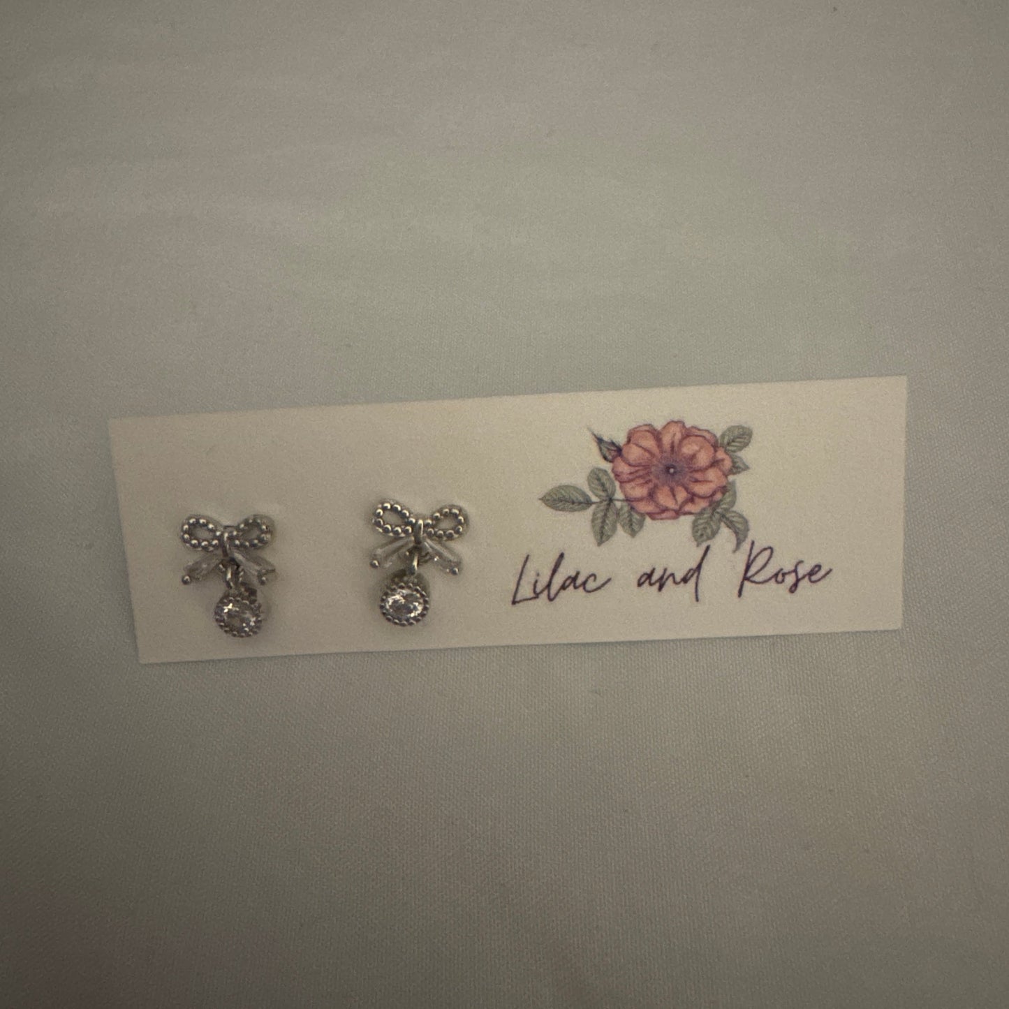 feminine drop earrings with CZ stones