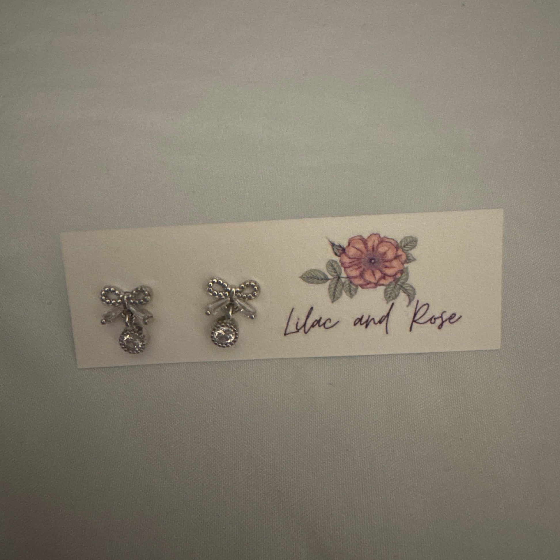 feminine drop earrings with CZ stones