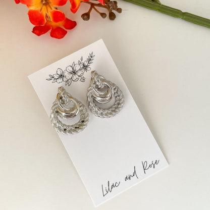 bold twisted statement earrings
