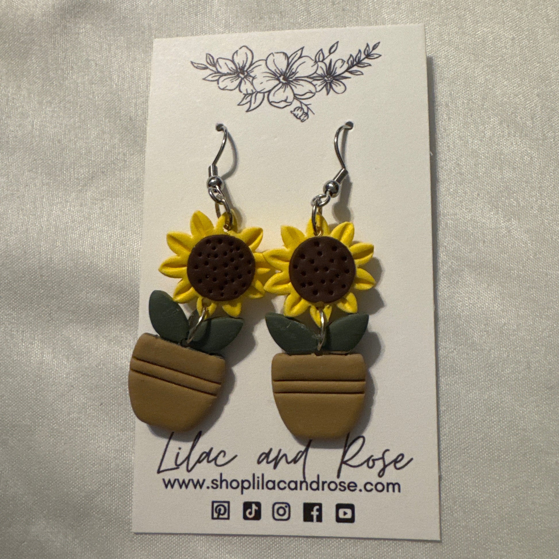 potted sunflower clay earrings handmade Lilac and Rose