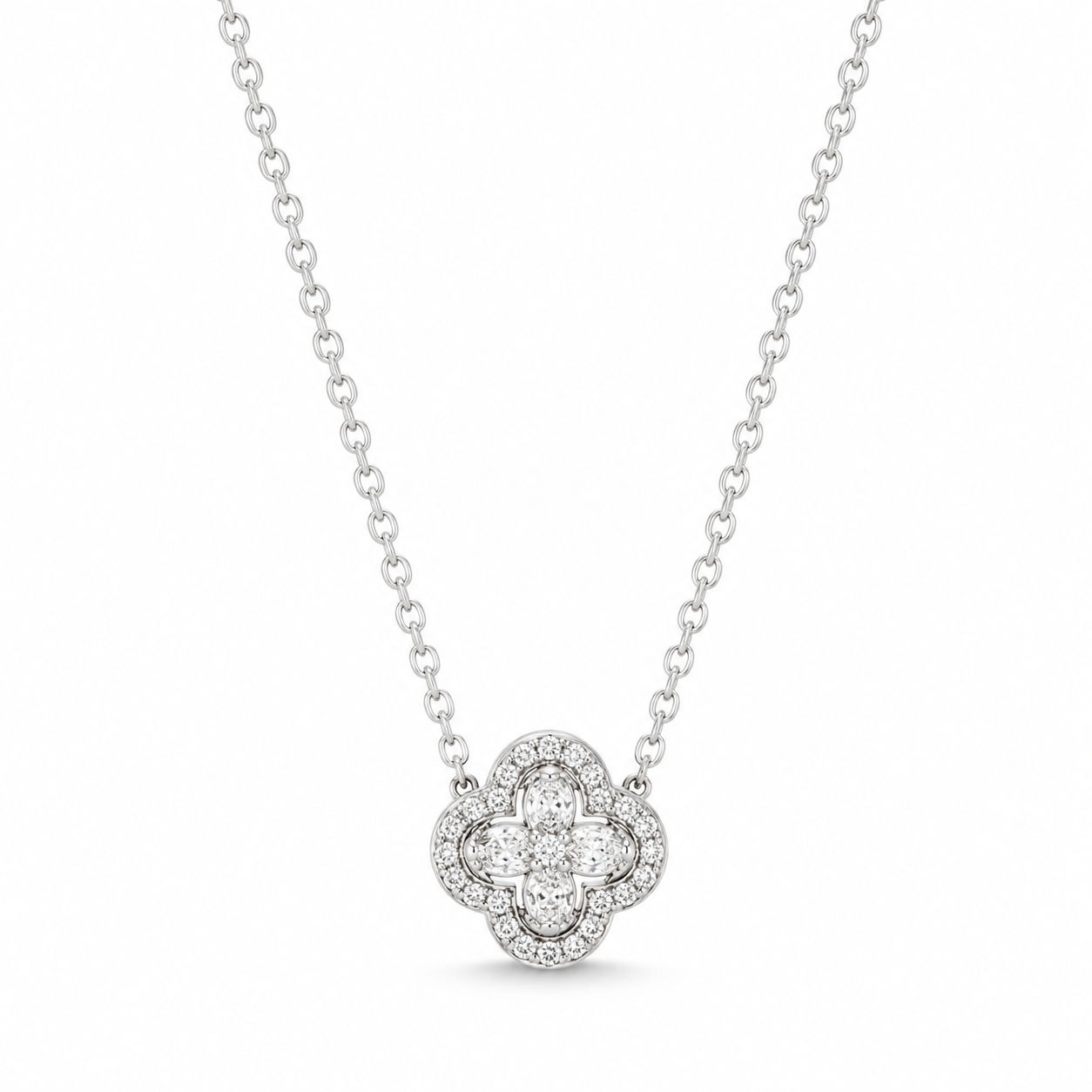 A silver-toned diamond necklace featuring a clover-shaped pendant with a central round diamond surrounded by a halo of smaller diamonds, suspended from a delicate cable chain against a white background.