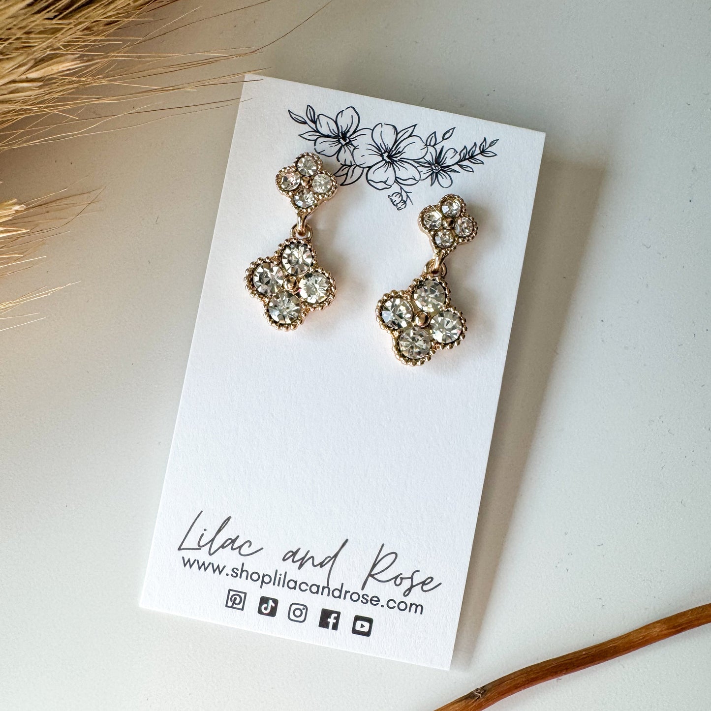 sparkly clover dangle earrings rhinestone