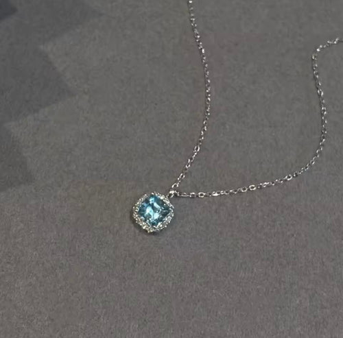 Gold necklace with sapphire blue cubic zirconia