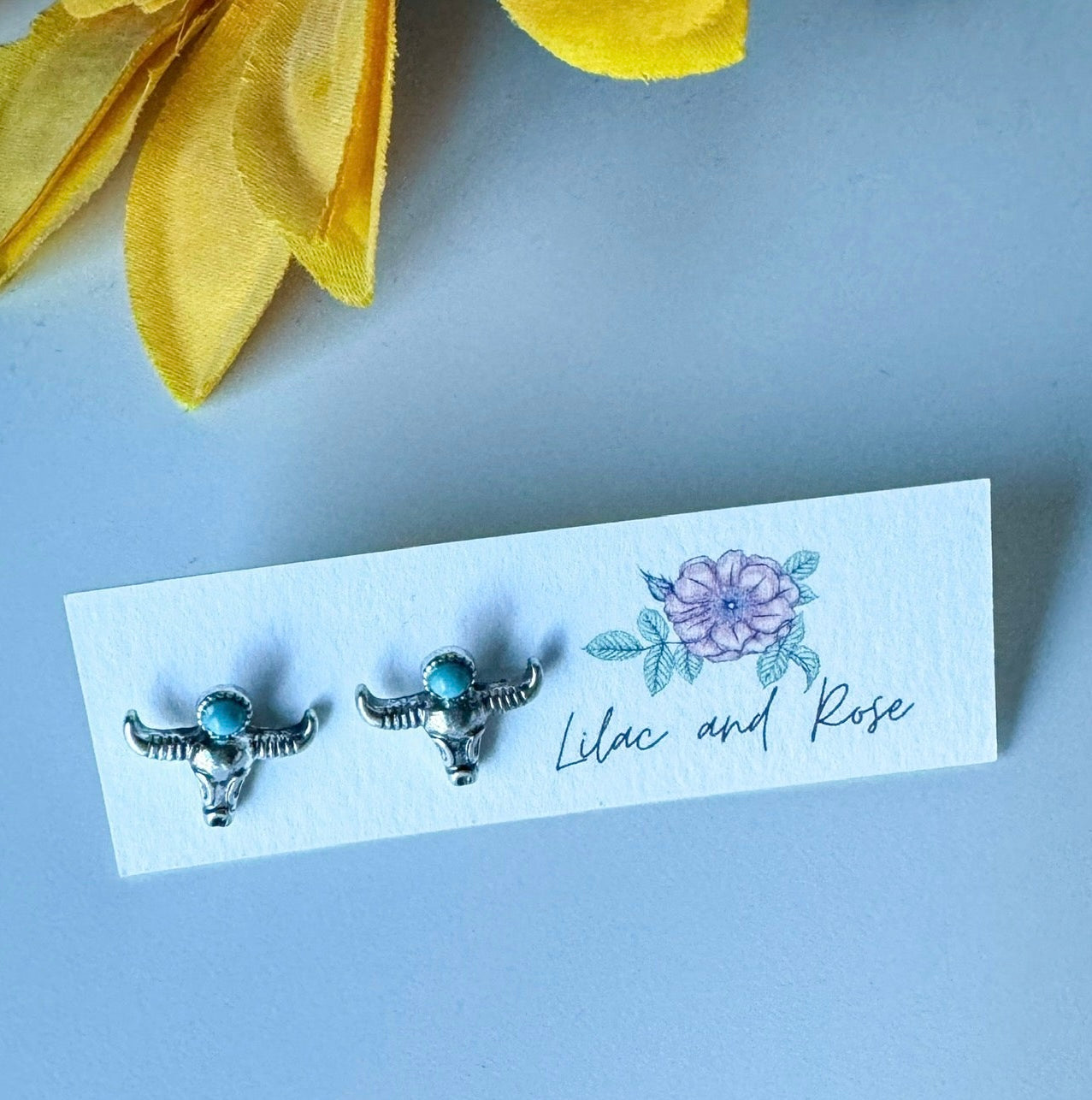western skull stud earrings turquoise detail