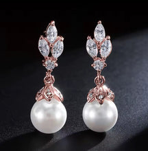 Load image into Gallery viewer, dainty hypoallergenic pearl earrings for weddings and everyday wear
