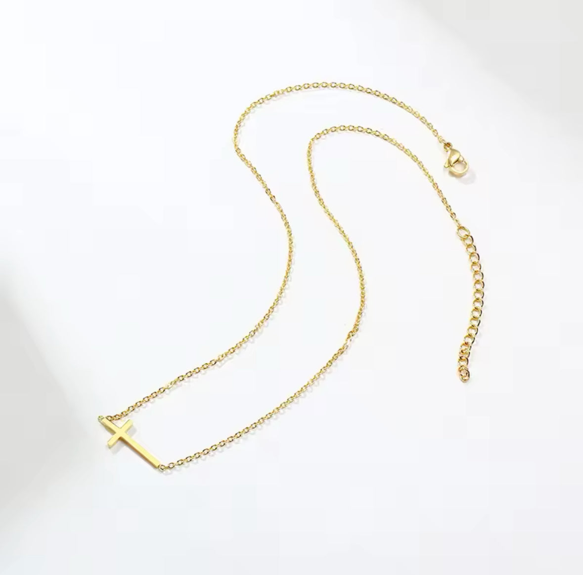 sideways cross necklace gold silver minimal faith jewelry