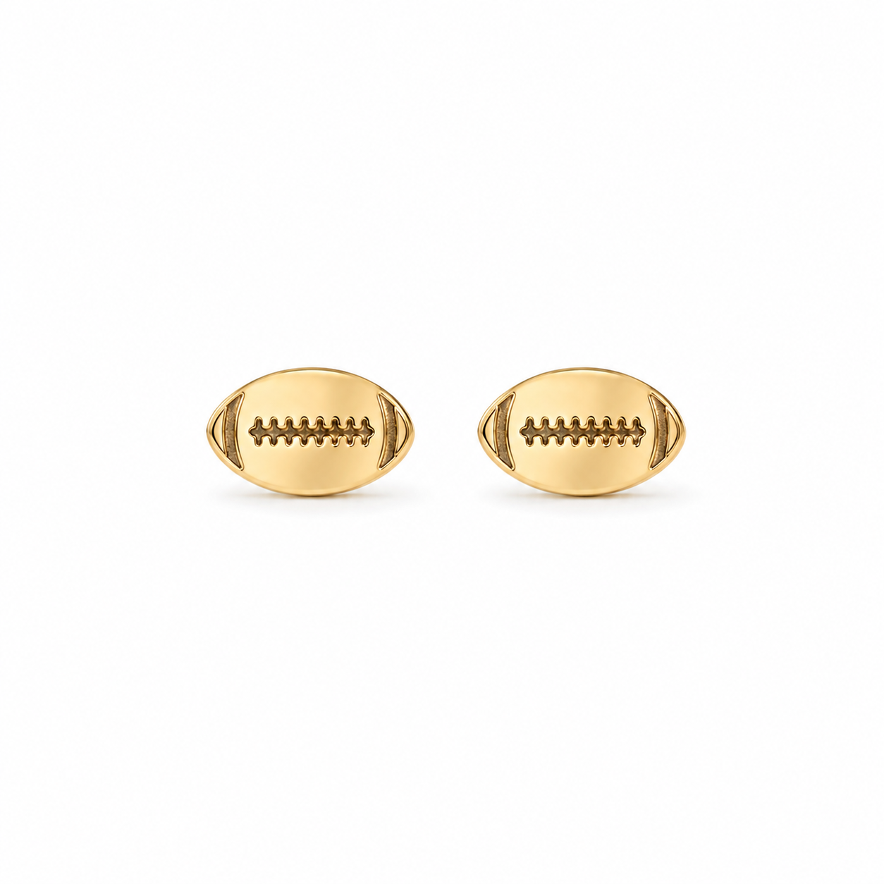 A pair of gold football stud earrings with detailed lacing, shown on a plain white background.